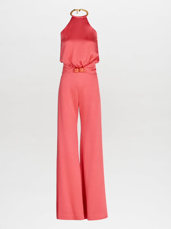 A Grosetto Jumpsuit Coral accessorized with a gold belt perfect for Resort 2024.