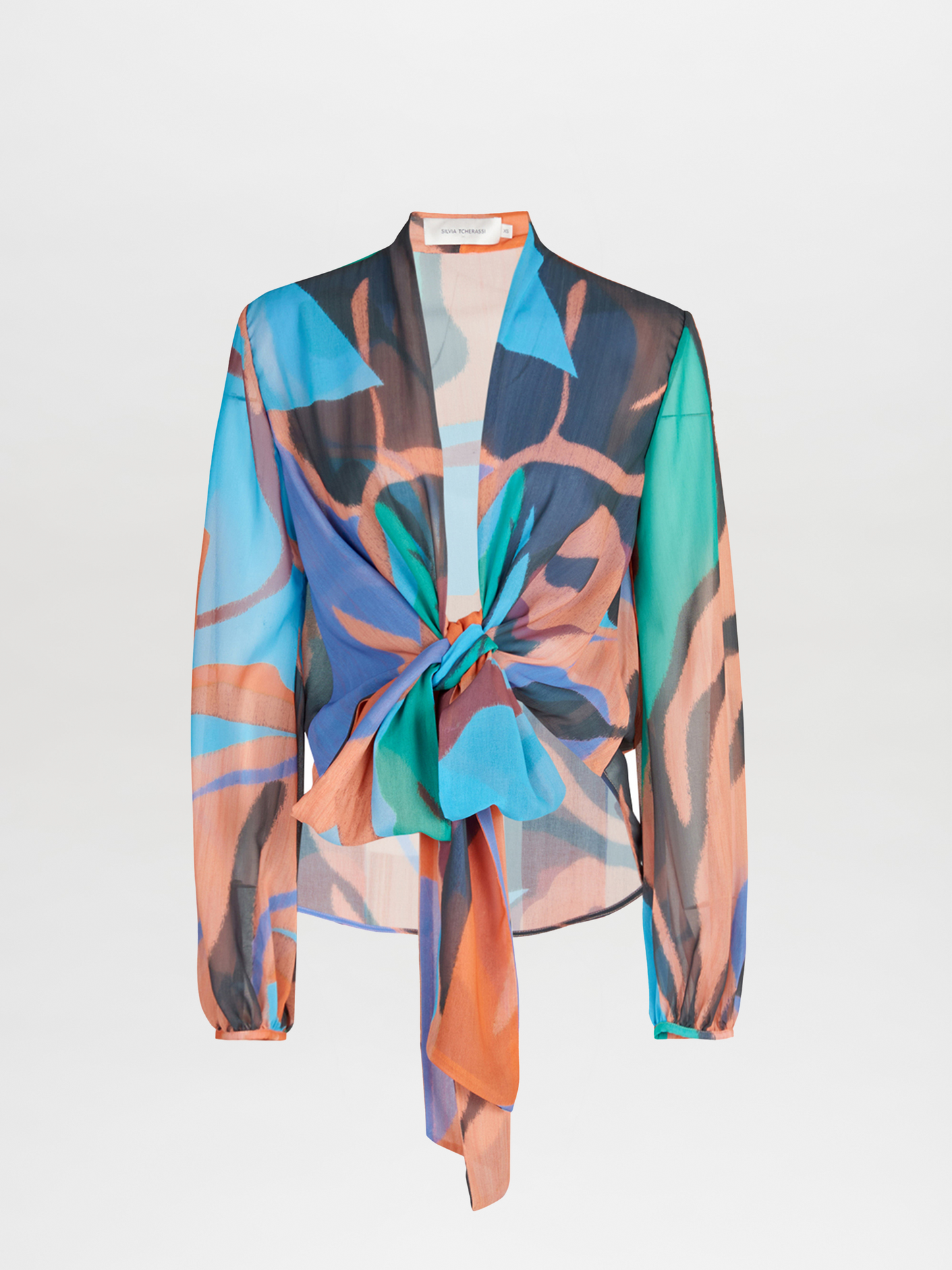 A navy blue Honey Blouse Pastel Multi Swirls with a colorful print on it.