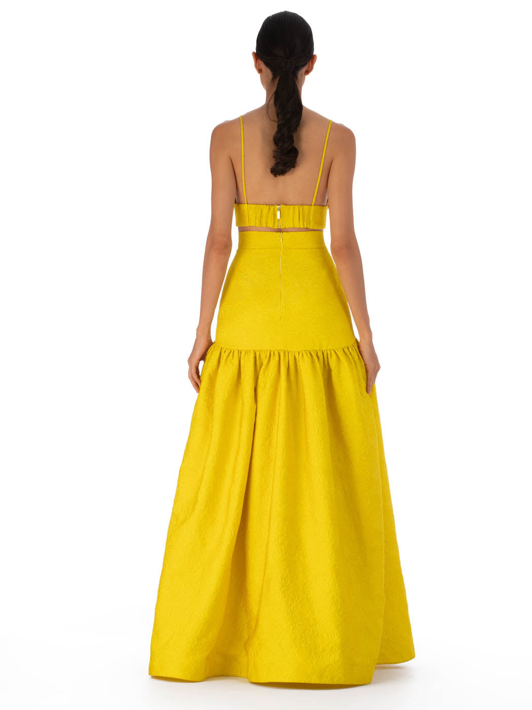 Yellow halter-neck evening gown with a full Eider Skirt Limoncello, displayed on a plain white background.