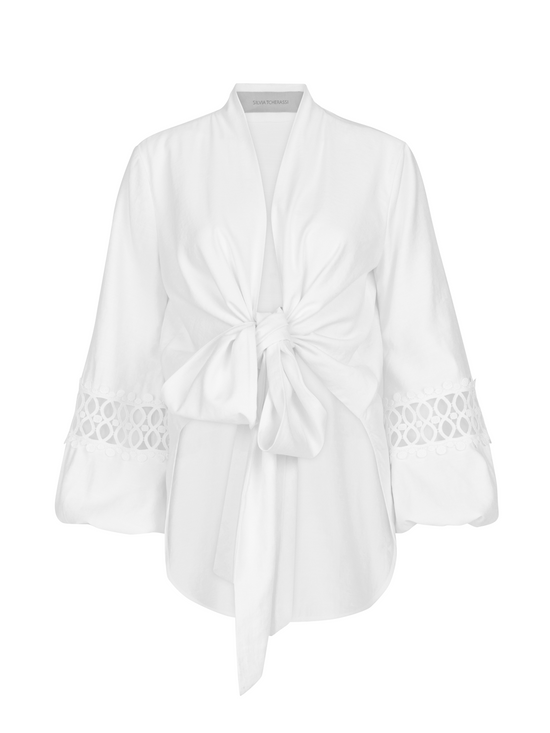 Irme Blouse White with a unique neckline featuring a bow on the front.