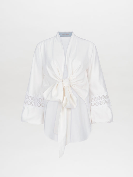 Irme Blouse White with a unique neckline featuring a bow on the front.