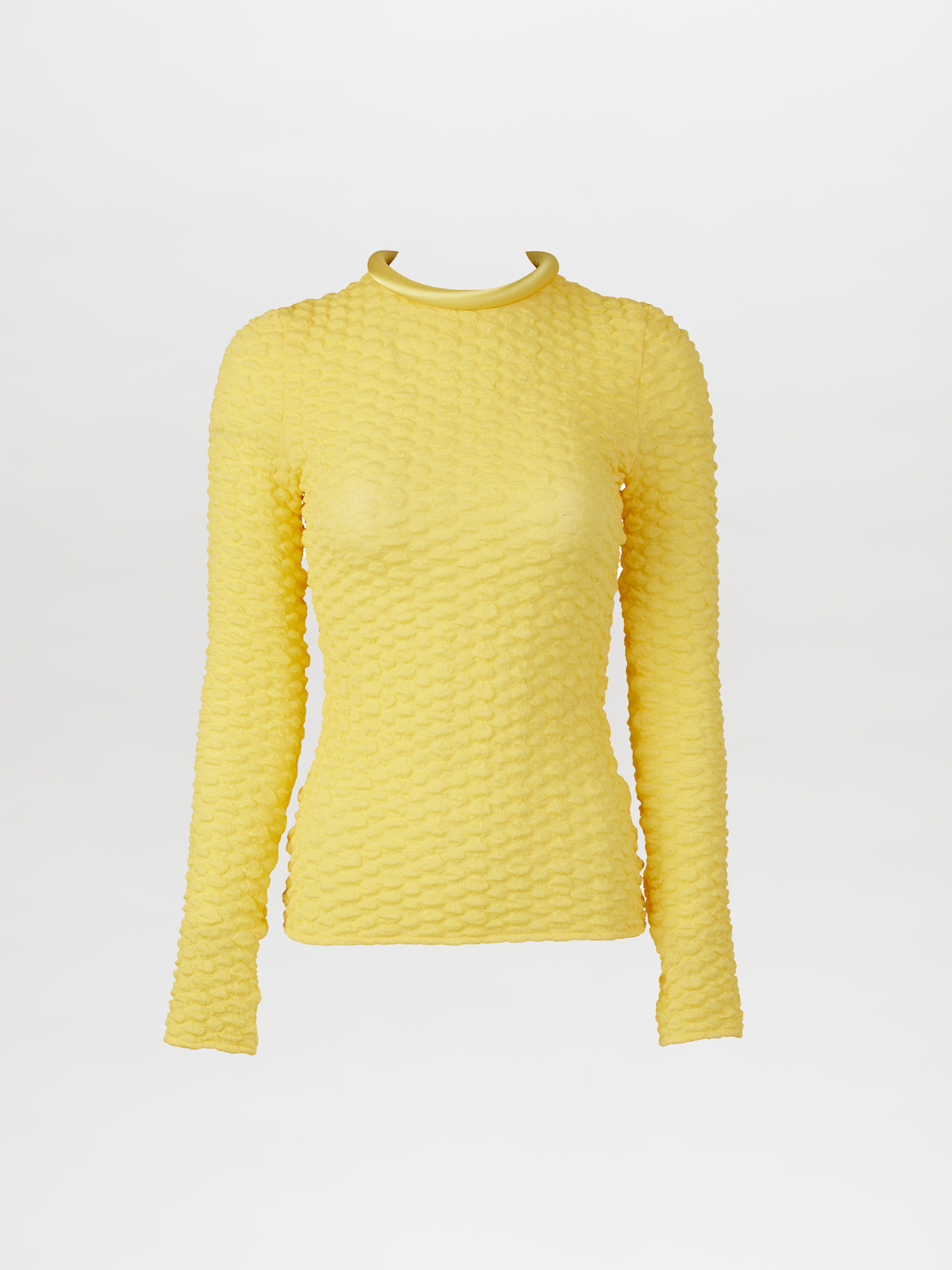 A versatile, long-sleeved Jari Top Yellow with a ruffled neckline made from embossed jacquard fabric.