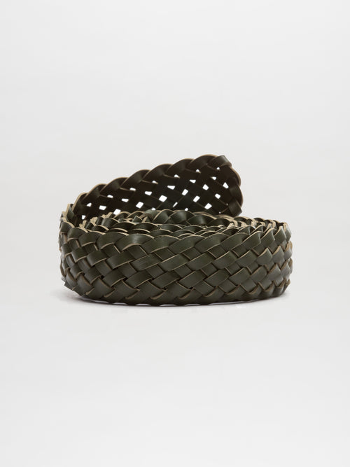 The Lauren Belt, crafted from 100% dark brown Italian braided leather, is coiled in a loop on a plain white background.