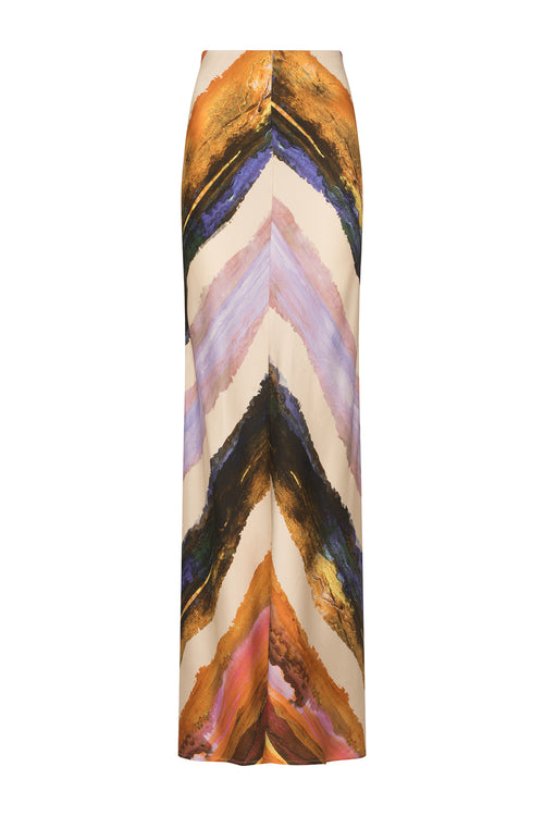 A high waisted Laurina Skirt Orange Orchid Abstract Stripes with a multicolored chevron print.