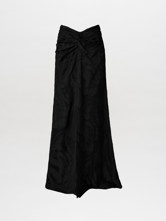 Elevate your style with the Lugnano Skirt Black Marble, featuring a black, strapless, floor-length gown design with an elongating silhouette and a subtle black abstract marble jacquard pattern. The ruched bodice elegantly stands out against its white background.