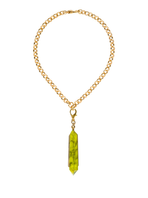 The Mariela Necklace Green features a gold chain with a green crystal pendant attached by a clasp, and it will be available for shipping on September 2nd, 2024.