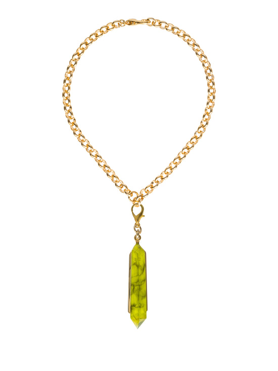 The Mariela Necklace Green features a gold chain with a green crystal pendant attached by a clasp, and it will be available for shipping on September 2nd, 2024.