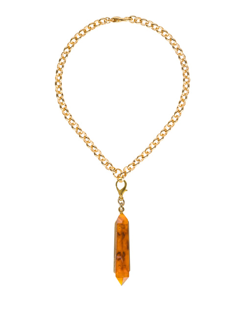 The Mariela Necklace Amber, featuring a gold chain and a stunning red crystal pendant, is perfect for adding elegance to your outfit. This timeless piece makes an ideal gift for occasions such as August 19th, 2024 or September 2nd.