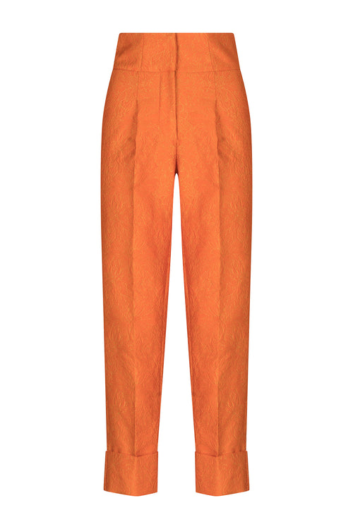 A pair of Moad Pant Orange Petal with pleating details.