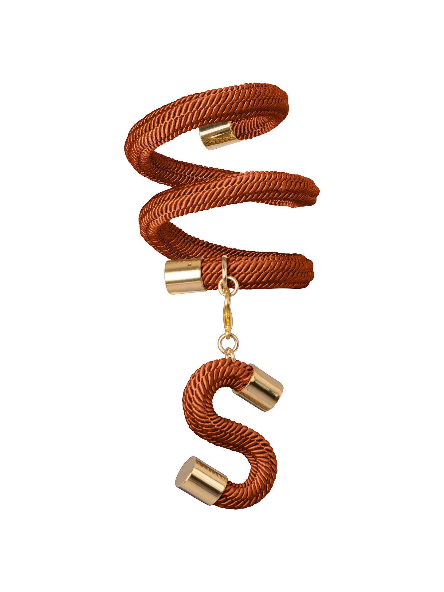 Introducing the Nicky Bracelet Ochre: a coiled brown rope bracelet with gold-colored end caps and a dangling "S" charm, setting you apart this August 19th.