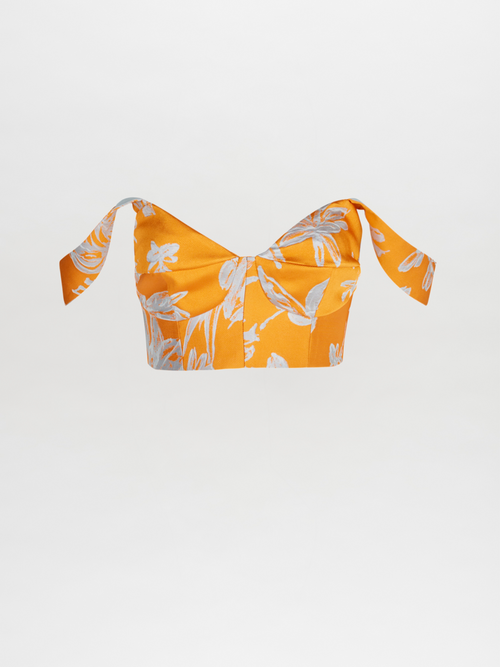 Nuoro Top Apricot Silver Floral with tie sleeves isolated on a white background.