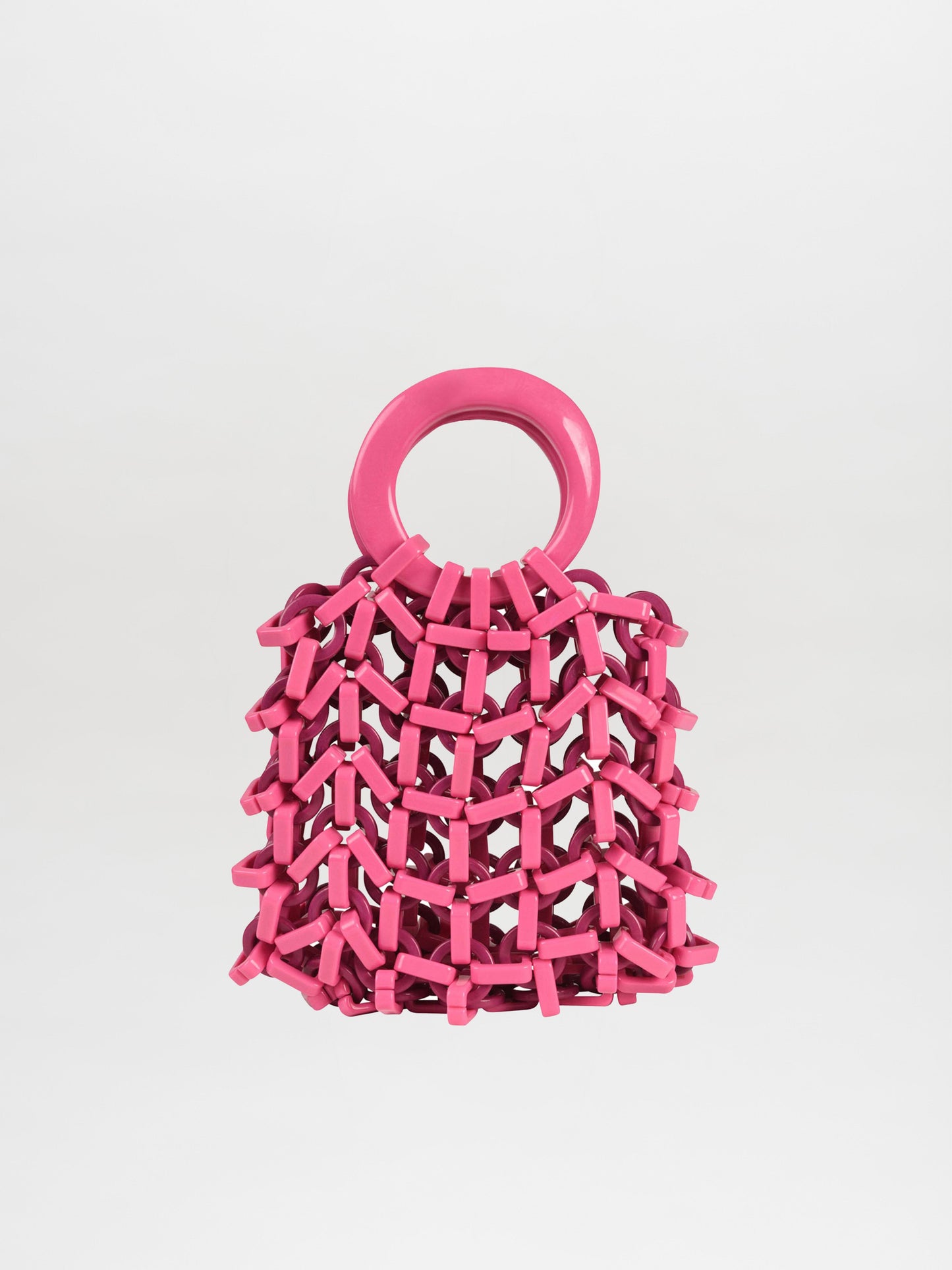 Omegna Handbag Magenta / Plum, featuring a circular handle and an open lattice design made from sleek acrylic resin, elegantly displayed against a plain white background.