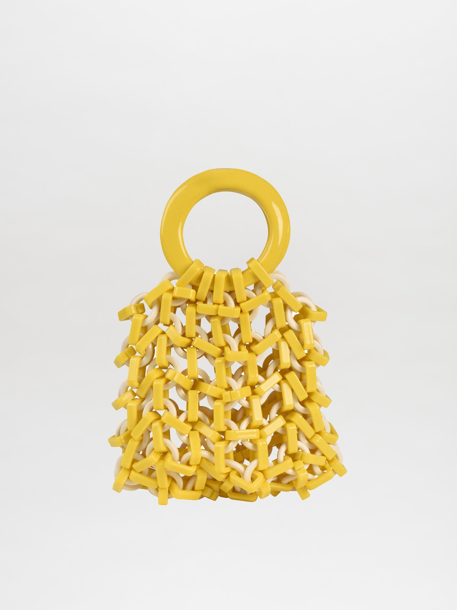 Introducing the Omegna Handbag in Yellow/White, a stylish accessory boasting a circular handle and a unique knit-like resin mesh design crafted with interwoven loops.