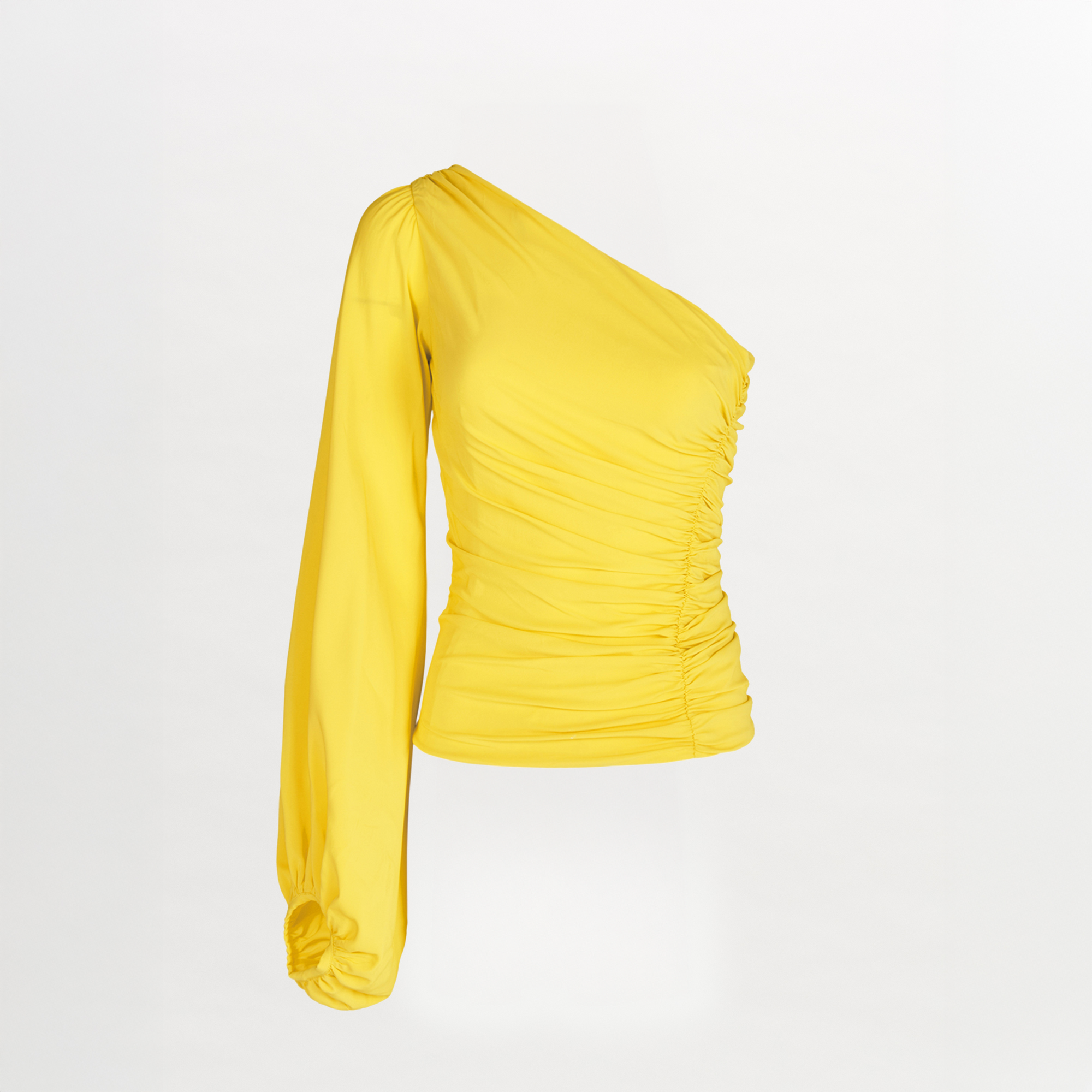A Oriana Blouse Yellow made of georgette fabric.