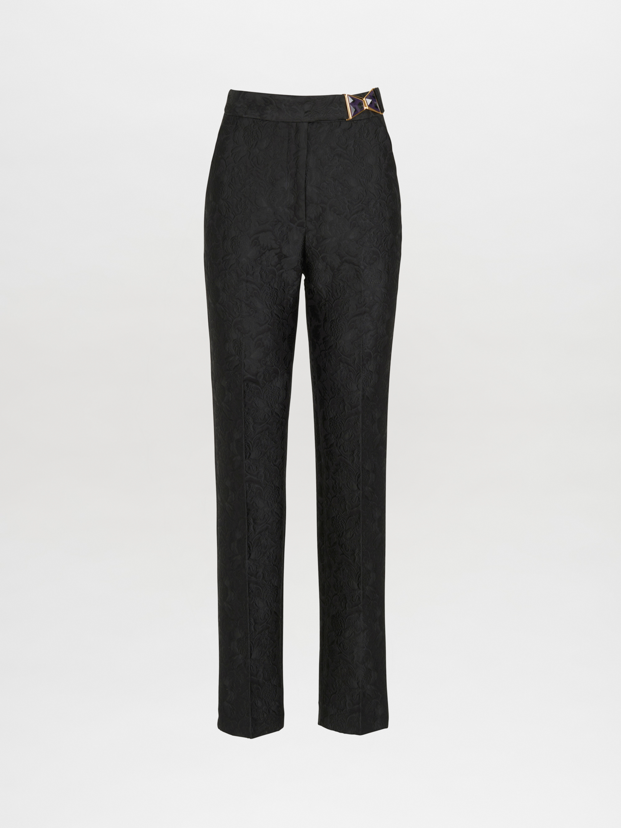 Orion Pant Black high-waisted pants with a patterned design and a gold detail on the waistband.
