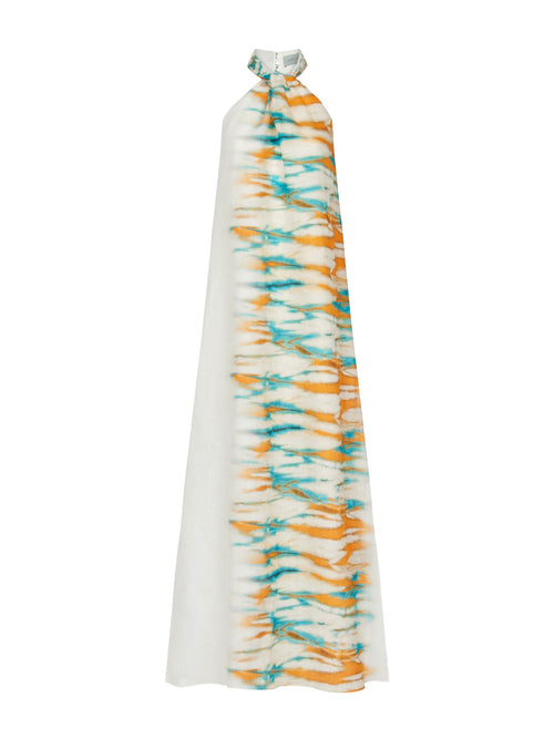 The Belina Dress in orange and turquoise is a long, sleeveless halter dress crafted from lightweight linen, showcasing a vibrant tie-dye pattern on a white background.