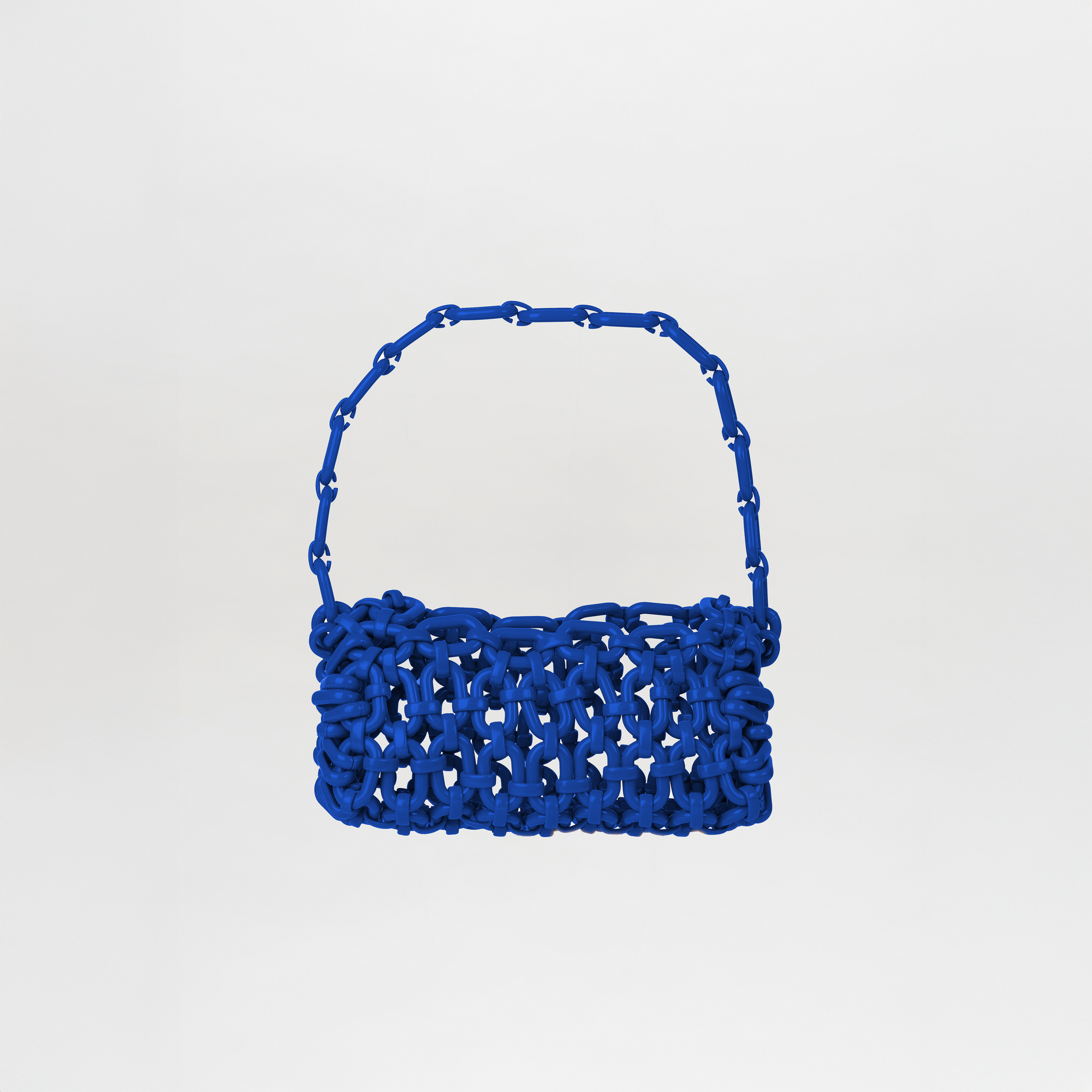 The Piceno Handbag Blue features a royal blue hue, chunky interlaced design, and a matching Italian resin chain strap, shown against a plain white background.