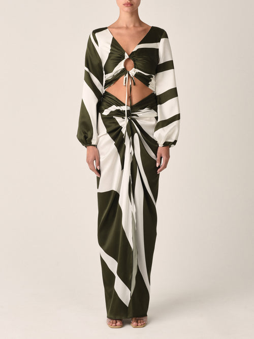 A black and white striped long-sleeve crop top with a central ring detail and drawstring ties at the bottom, offering an Odette Blouse Green Abstract-inspired look perfect for any occasion.