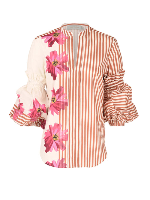 Kaye Blouse in Magenta Floral Brushstroke Stripes, designed with long, ruffled sleeves and a flattering fit, boasts a large pink floral print and subtle brushstroke stripes.