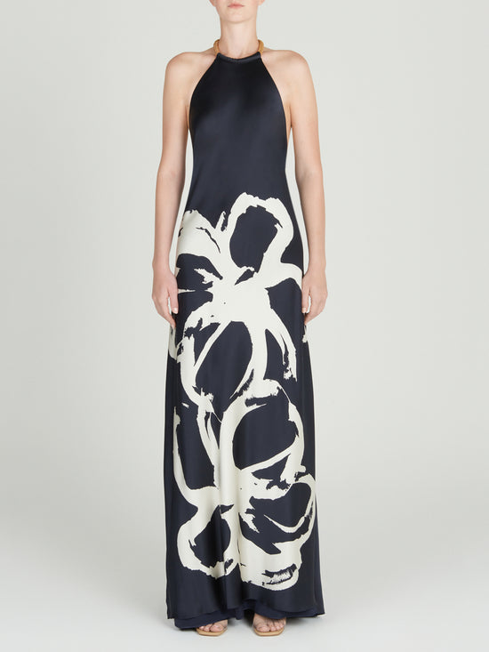 A navy Zeffa Dress Midnight Bloom with a floral abstract print.