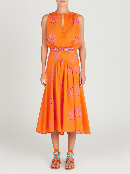 A Daila Dress Orange Lilac Embroidery with lilac-hued embroideries.