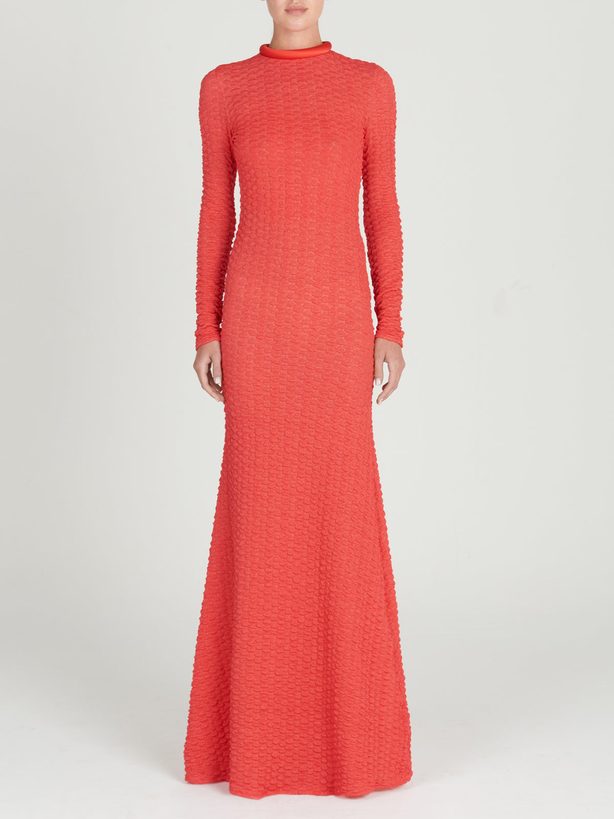 The Gabbice Dress Rouge in coral fabric is long-sleeved.