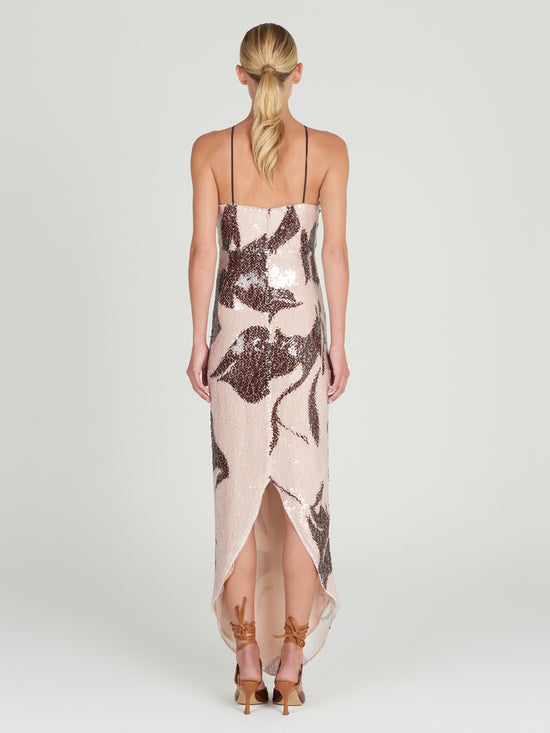 A Lisseth Dress Cacao Rose with a floral pattern embellished with sequins.