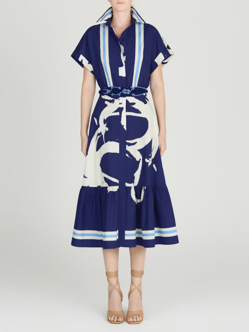 A blue and white print Loni Dress Navy Stripes made of cotton.