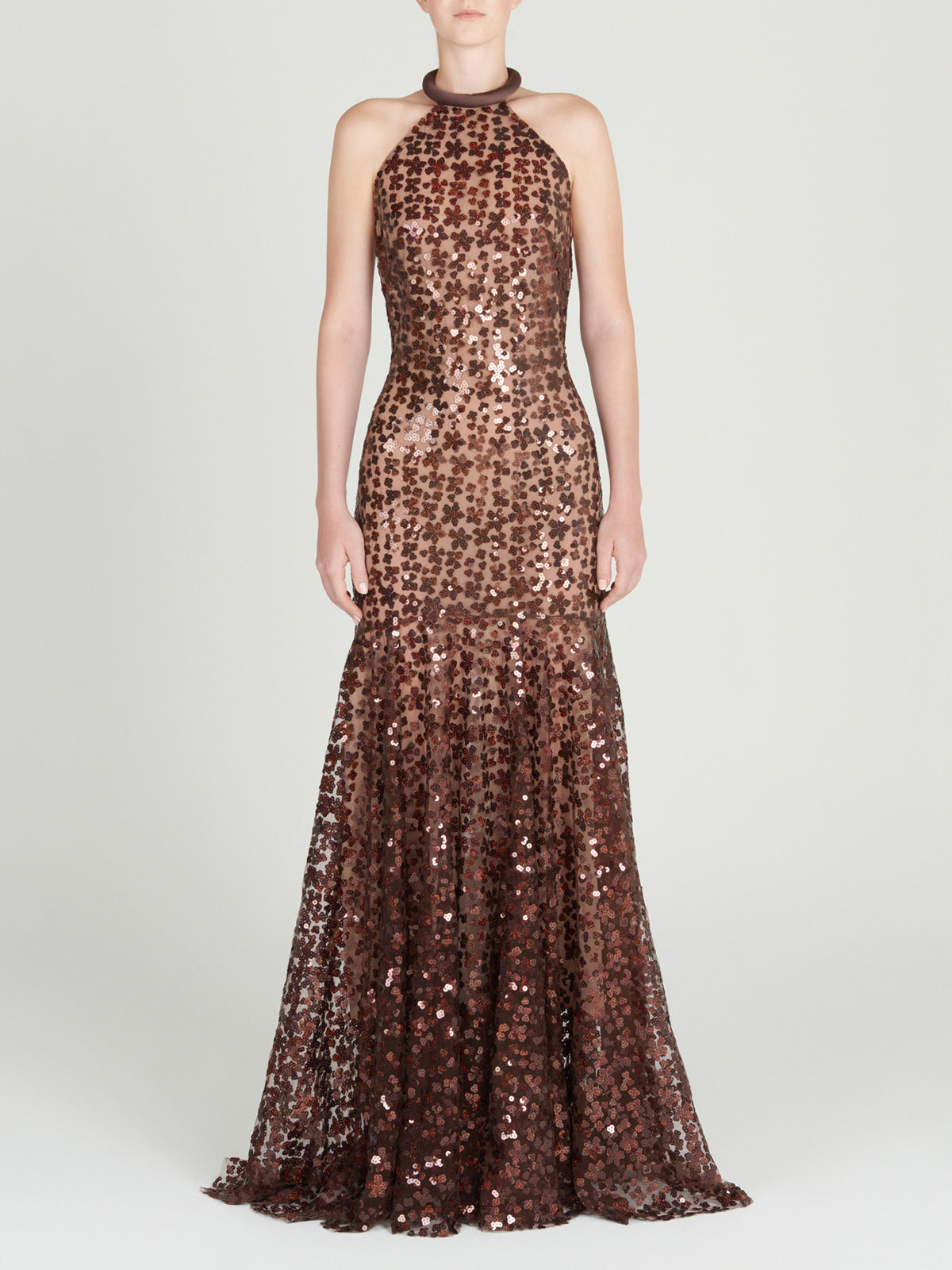 A brown Terni Dress Bronze Night Bloom with bronze sequin detailing on a mannequin.