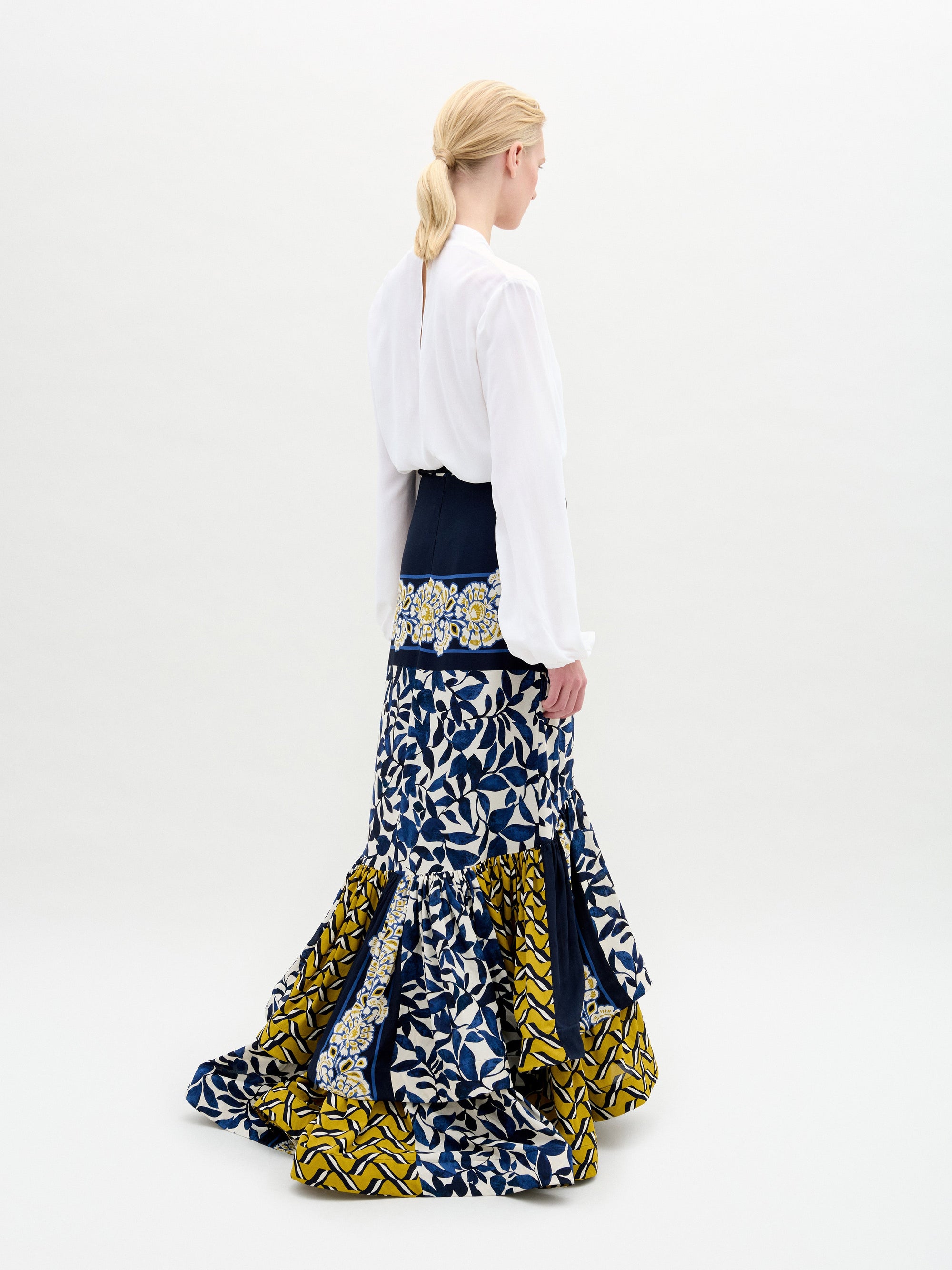 ROCIO_BLOUSE_-_WHITE_ELLIOT_SKIRT_-_NAVY_GEOMETRIC_ABSTRACT_FLORAL_BACK_PRE-FALL_2025_copy