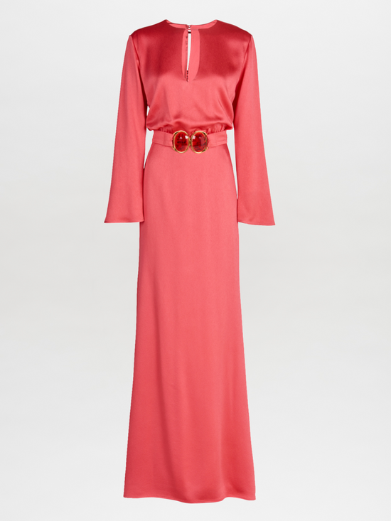 A sleek Ravenna Dress Coral floor-length dress with a belt.