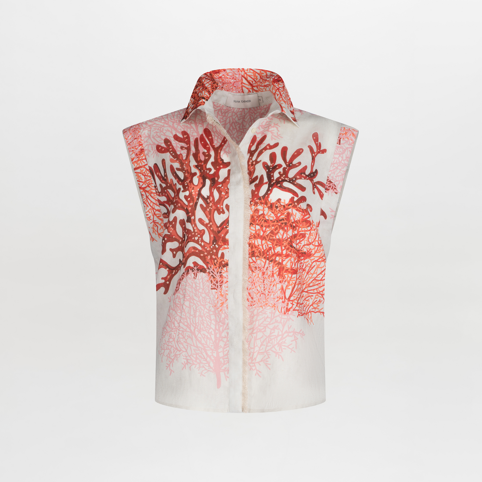 Rina Blouse Multi Coral with a multicolor coral motif on a white background, featuring a classic collar and concealed button trail.