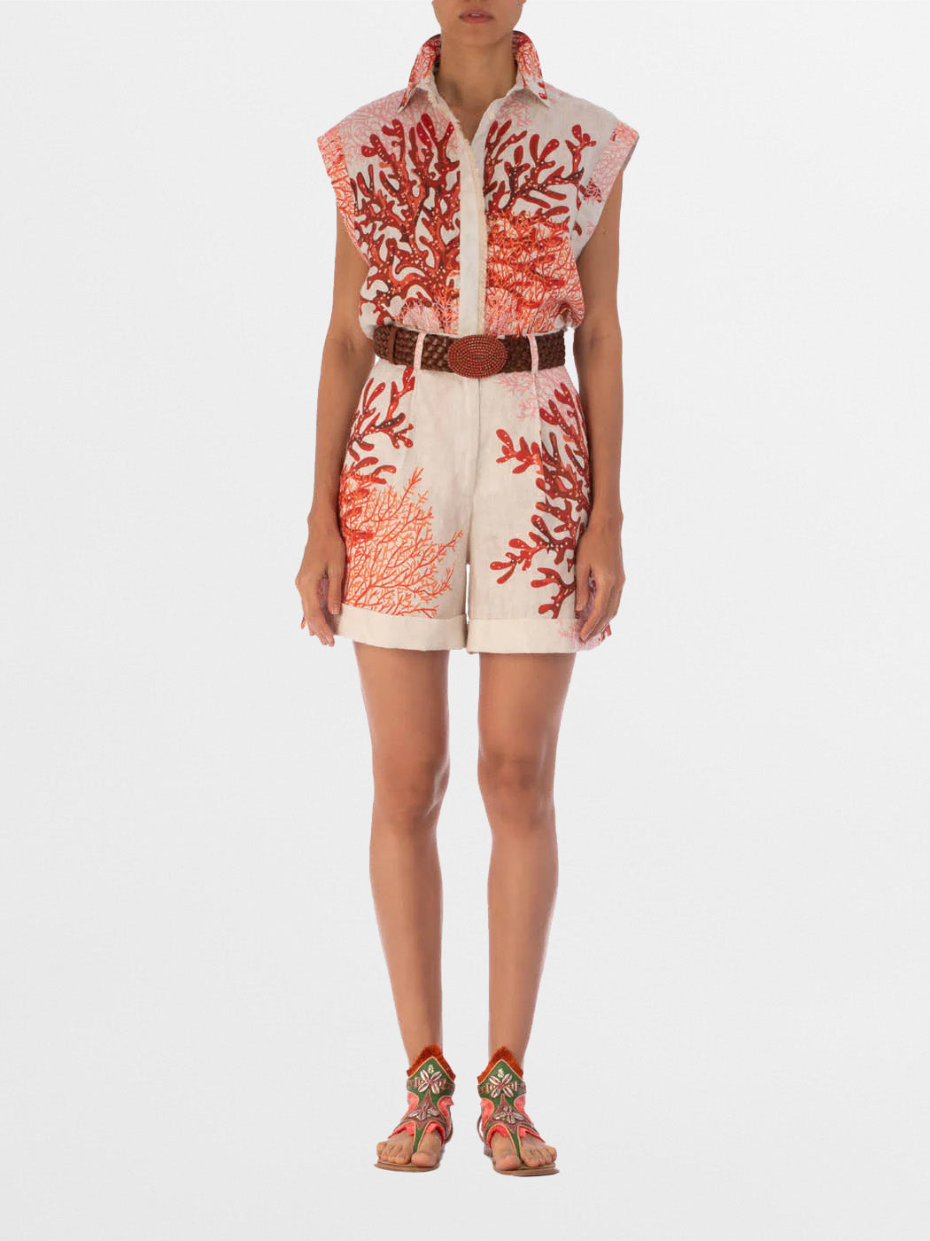 Rina Blouse Multi Coral with a multicolor coral motif on a white background, featuring a classic collar and concealed button trail.