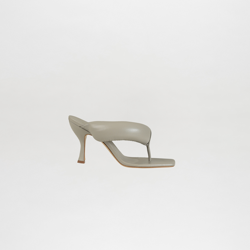 Light gray high-heeled sandal on a white background