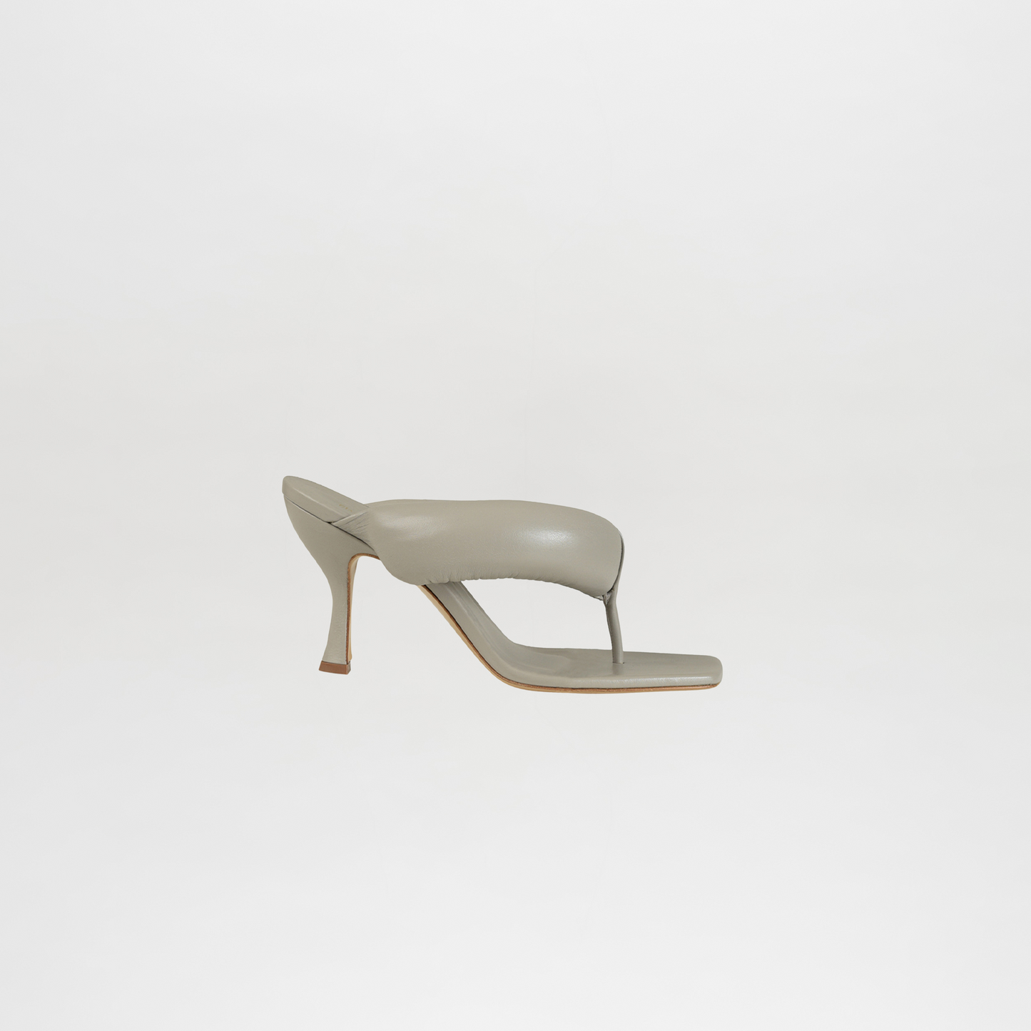 Light gray high-heeled sandal on a white background