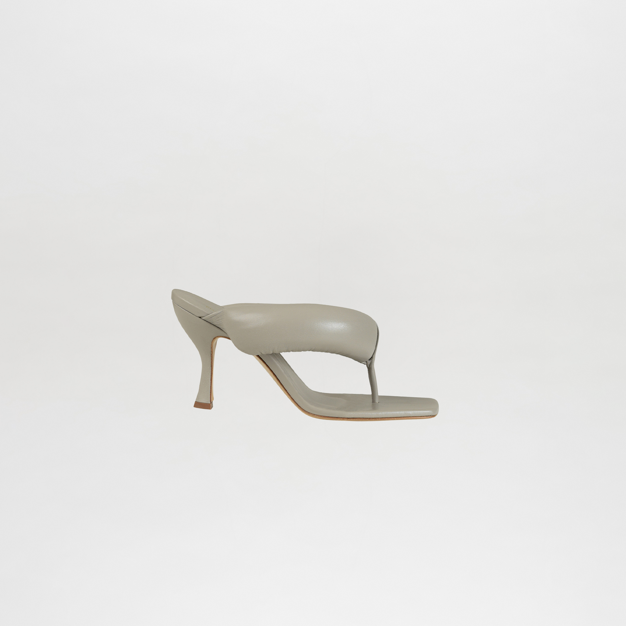 Light gray high-heeled sandal on a white background