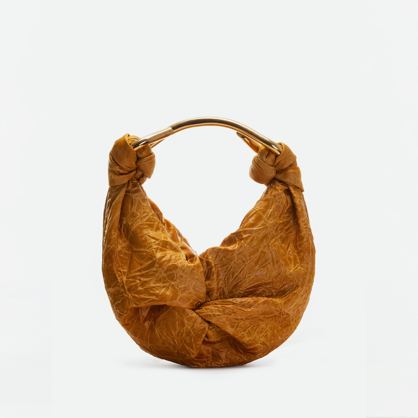 The Sofia Bag Small is a brown, textured handbag made from stropicciato fabric with a curved gold-toned handle and knotted side details, shown against a plain white background.
