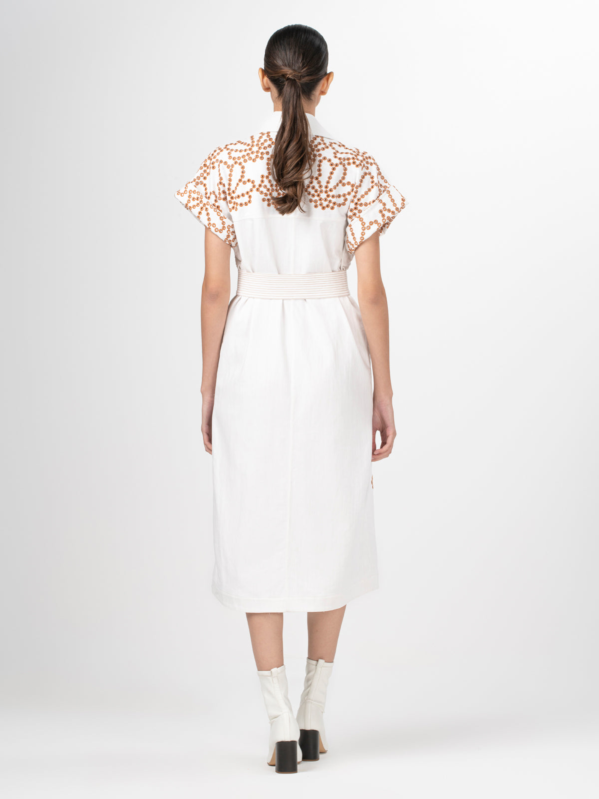 A lightweight, Concetta Dress White Cacao Eyelet robe with a self-tie waist belt.