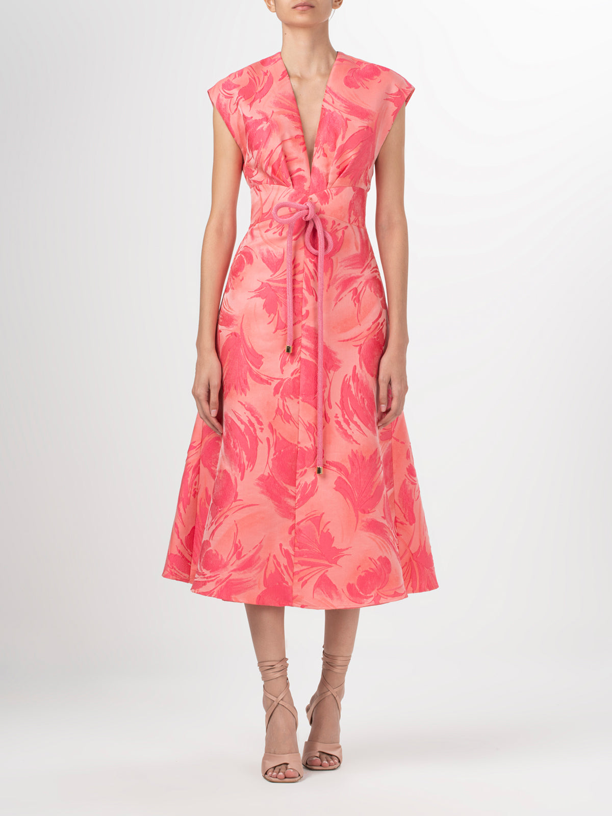 A Acalia Dress Fuchsia Pink with a floral print and V neckline.