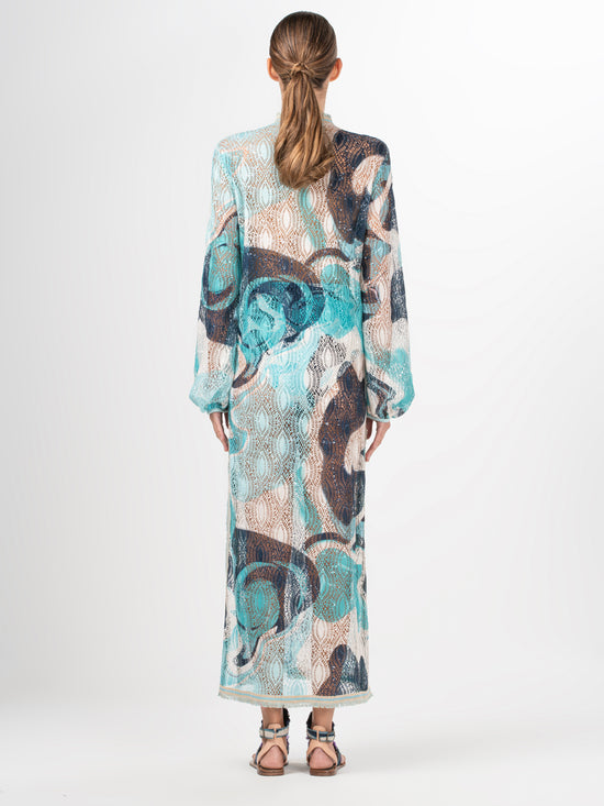 A long Akira Tunic Turquoise Marble with a multicolor abstract print.