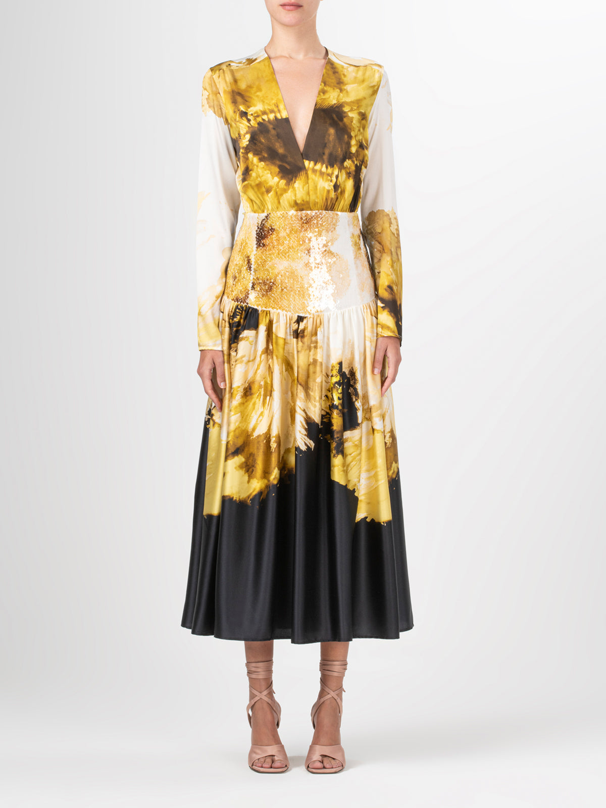 A Azalena Dress Golden Peony with a floral print in gold and black.