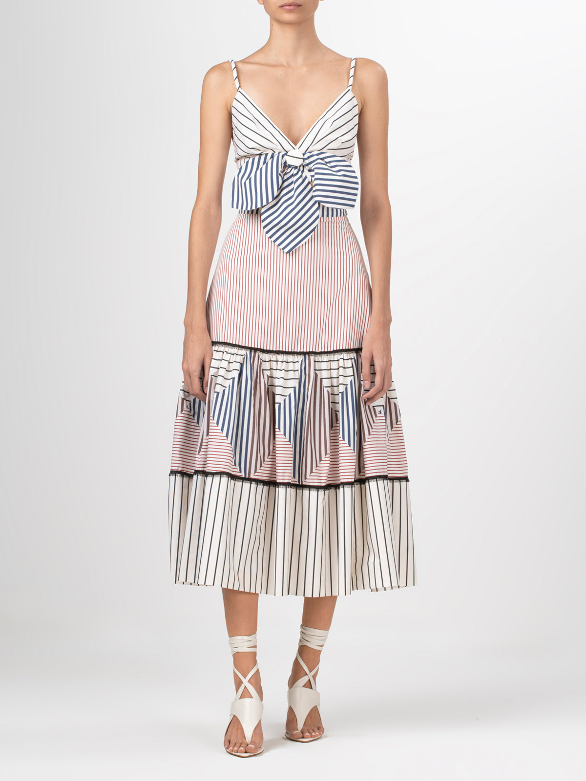 A Guillermina Skirt Multicolor Stripes with high waisted skirt with contrasting black and white stripes.