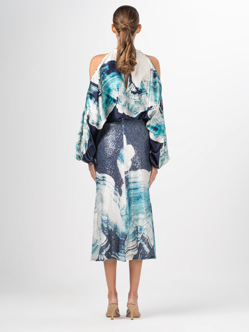 A Janina Blouse Navy Abstract Wave scarf with an abstract print.