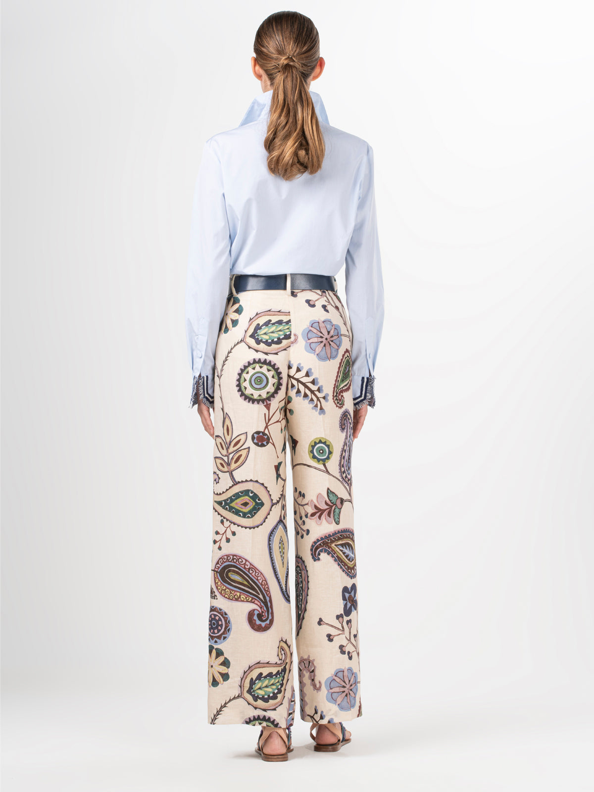 Emine Pant Blue Green Paisley with an abstract paisley print and a lightweight drape.