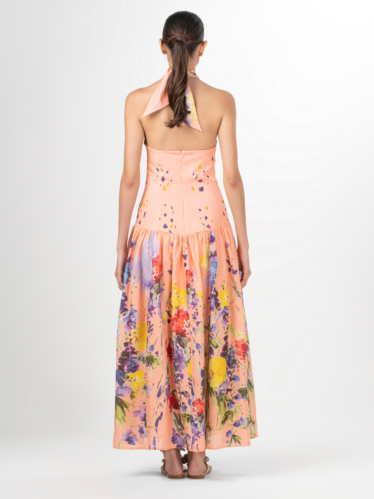 A Zaira Dress Apricot Spring Garden with a multicolor floral print.