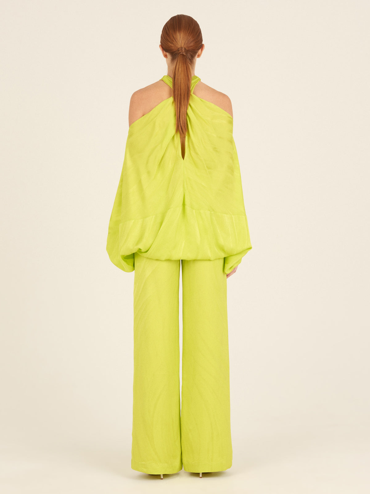 A Juno Blouse Verde Lime on a white background.