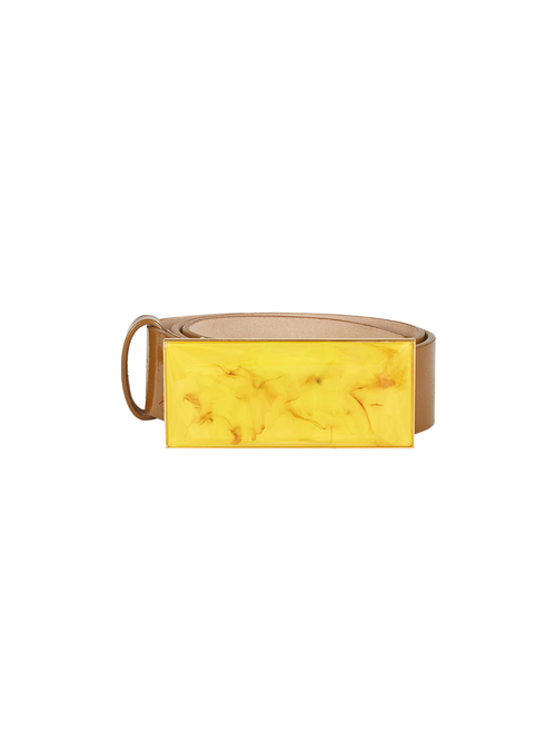 The Dora Belt Amber, part of Silvia Tcherassi's Spring 2023 Collection, features a tan design complemented by a wide rectangular yellow marble-patterned buckle.