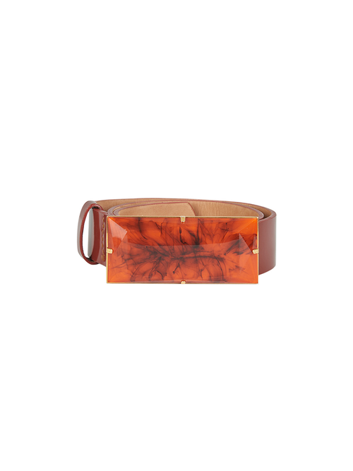 The Dora Belt Brick from the Silvia Tcherassi Spring 2023 Collection, featuring a brown leather design with a large, rectangular, marbled amber-colored buckle.