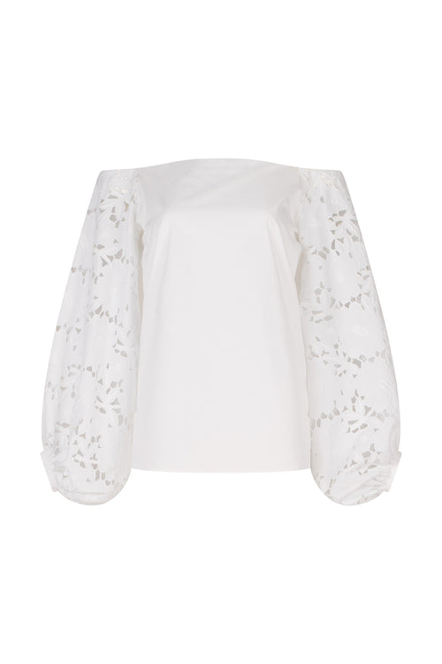 A white Stephanie Blouse White with lace bishop sleeves.
