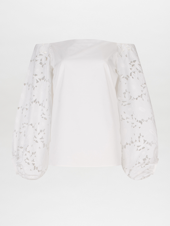 A white Stephanie Blouse White with lace bishop sleeves.